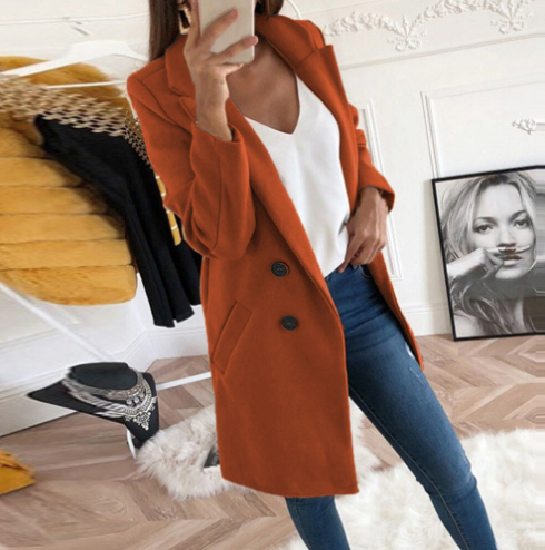 Back view of a warm women's winter jacket and coat