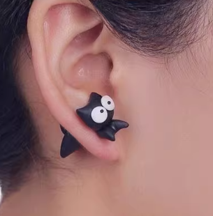 Women's cute cat paw shaped earrings worn on ear