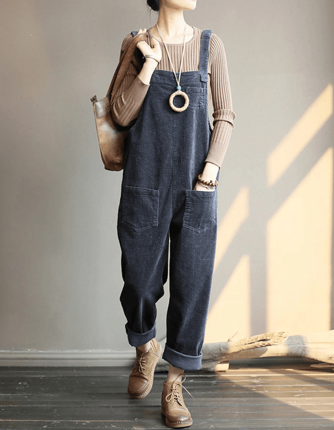 Comfortable women's one-piece overall jumpsuit with front pockets