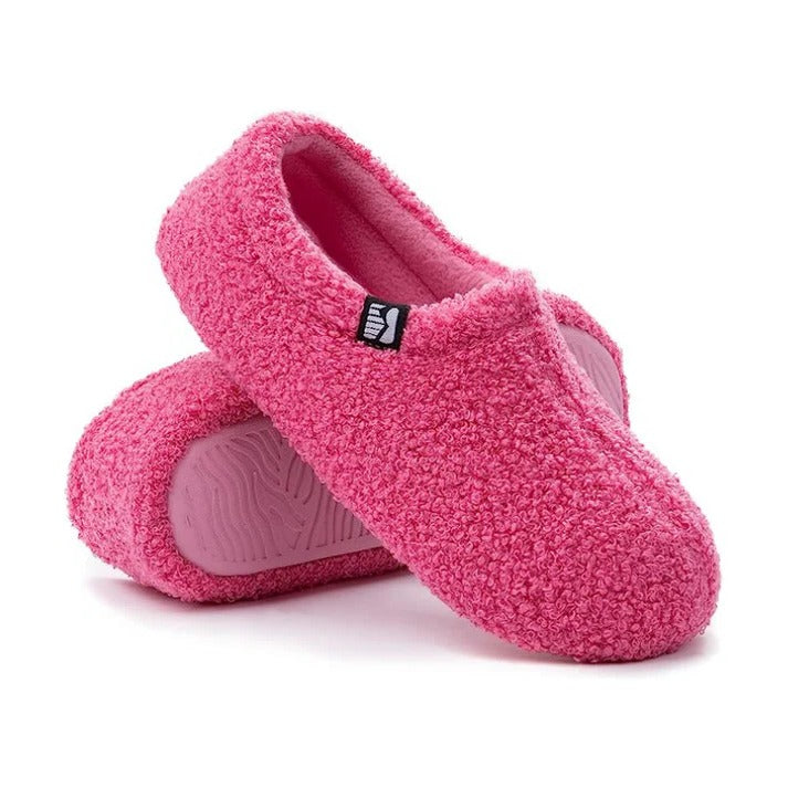 Top-down view of unisex indoor shoes showcasing fluffy sherpa texture