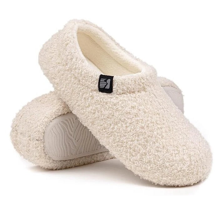 Close-up of thick memory foam insole inside comfortable fleece slippers