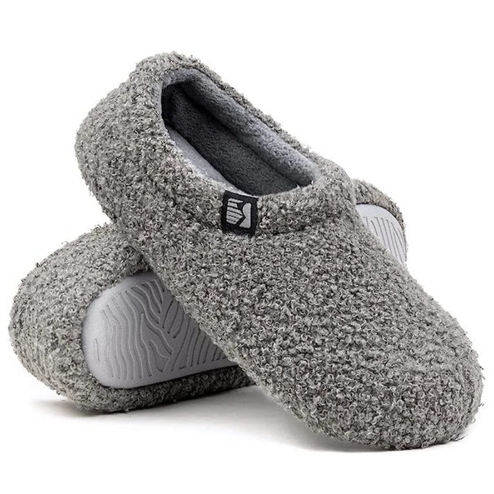 Side profile of plush slip-on house shoes with cushioned sole