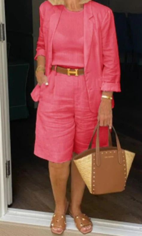 Back view of a fashionable womens blazer shorts suit outfit