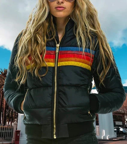 Close-up of women retro stripe puffer jacket fabric and zipper detail, winter outerwear coat