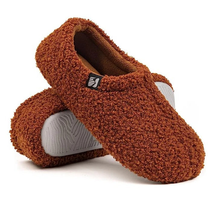 Comfortable indoor footwear featuring soft fleece lining and warm upper