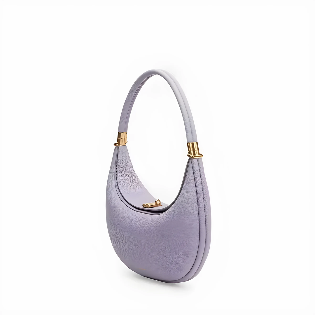 Trendy crescent bag open to show spacious interior compartments for daily essentials.