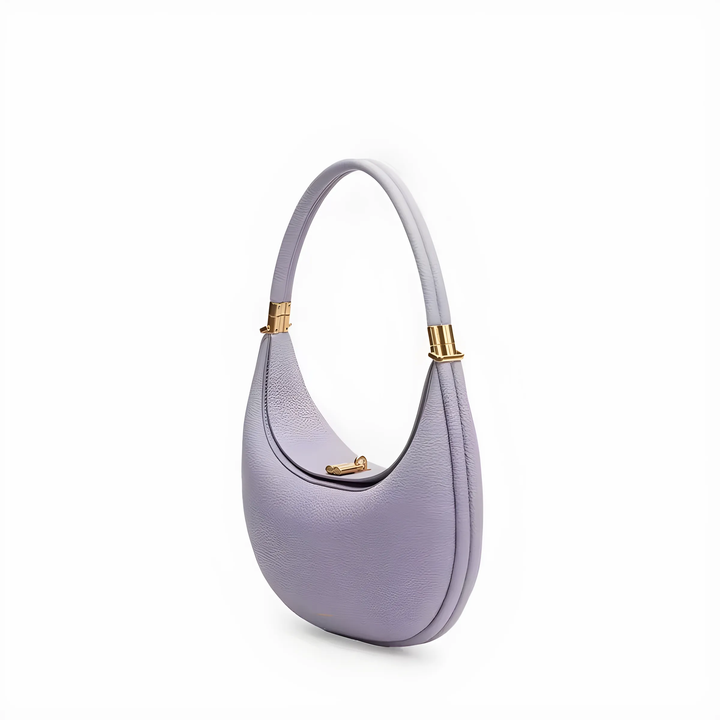 Trendy crescent bag open to show spacious interior compartments for daily essentials.