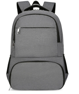 Close-up of USB port and durable zipper on the waterproof laptop backpack