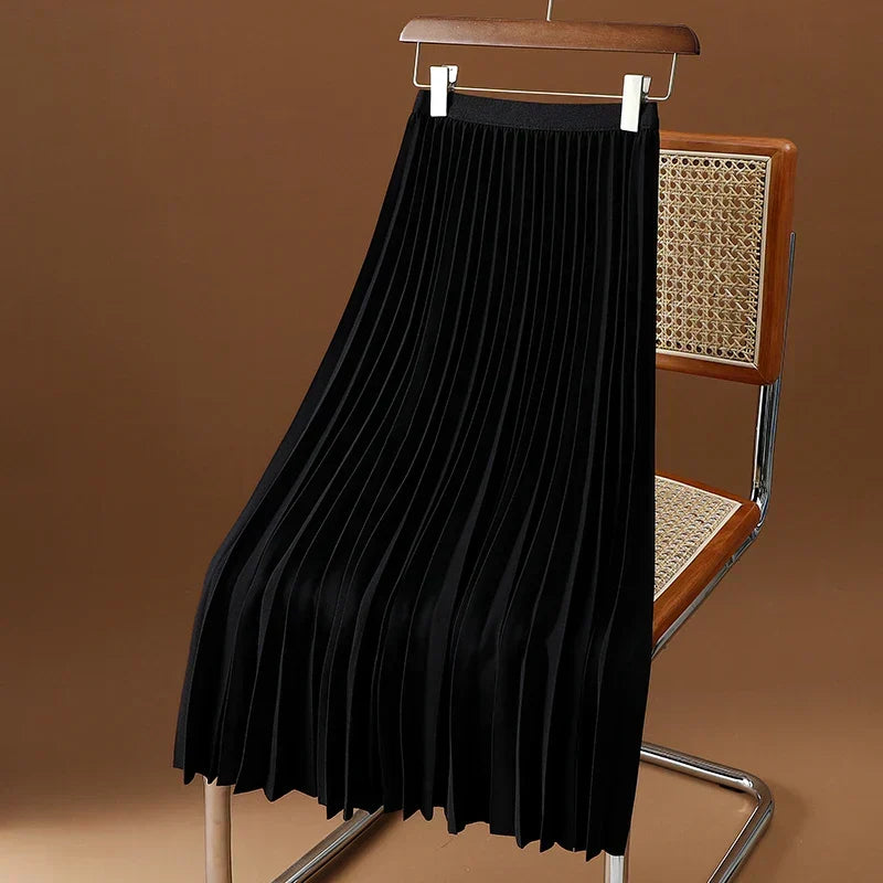 Versatile women's midi skirt featuring pleated design and elastic closure