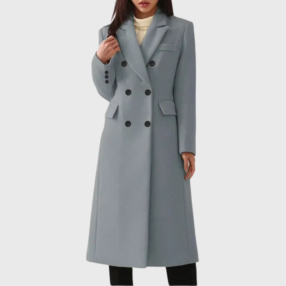 Model wearing a grey double-breasted long tailored coat with structured midi fit