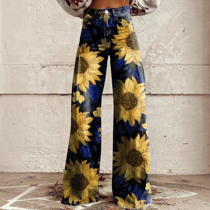 Angled view showcasing the drape of the wide leg floral bell bottoms