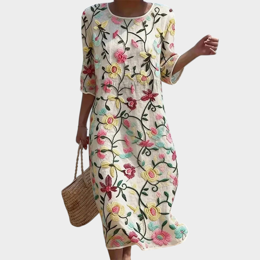 Women's floral embroidered midi dress with three-quarter sleeves and round neckline