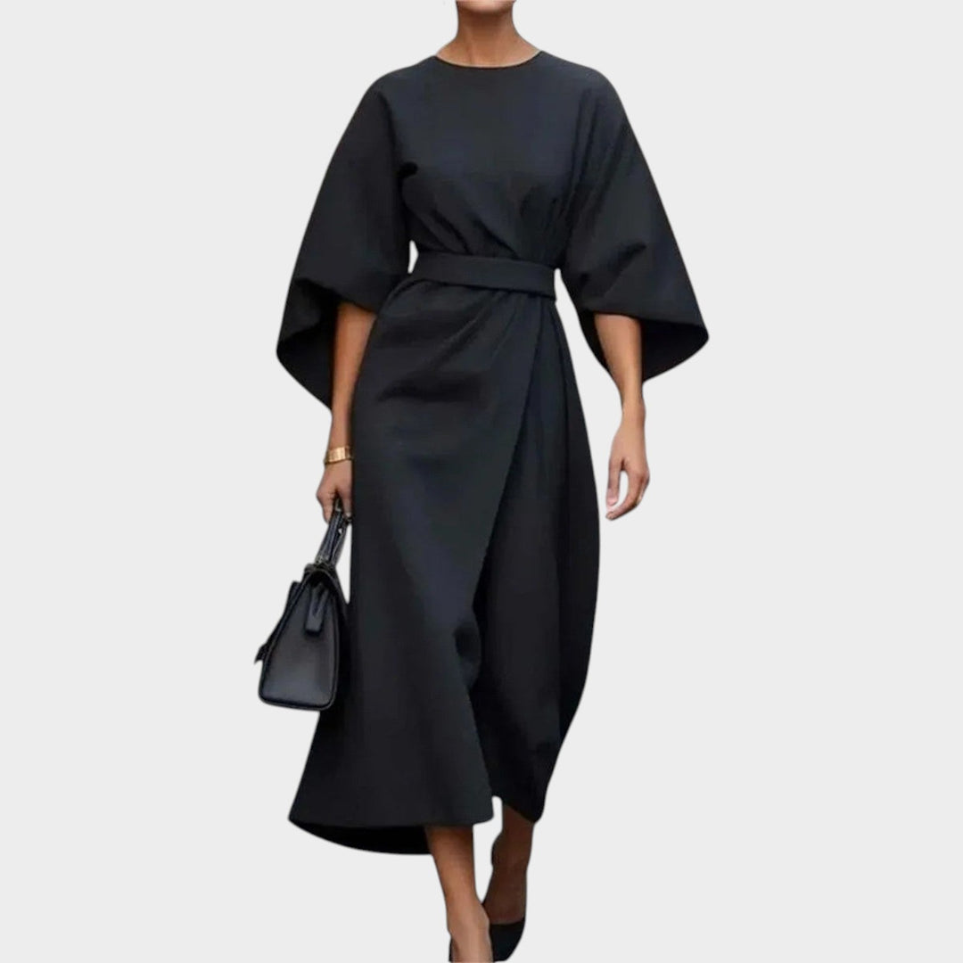 Detailed shot of fabric and drape on a luxurious womens maxi dress