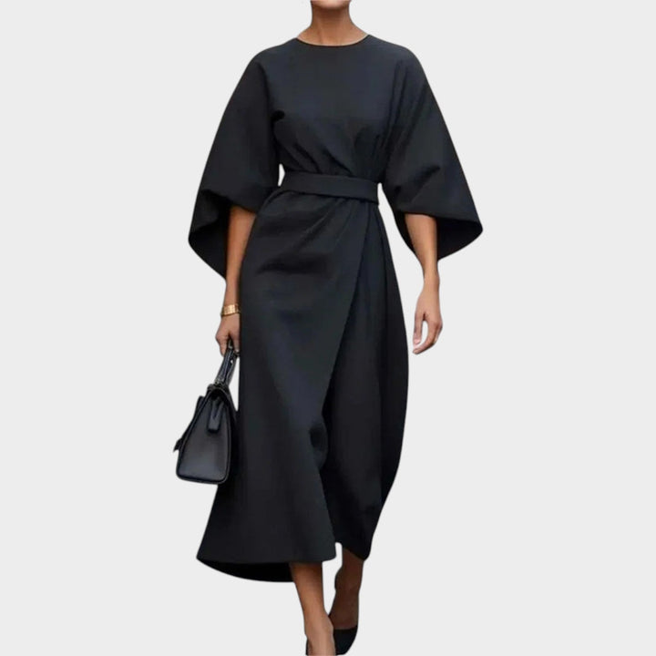 Detailed shot of fabric and drape on a luxurious womens maxi dress