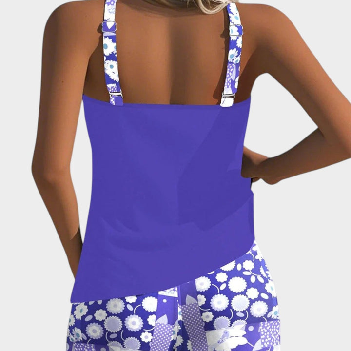 Back view of woman wearing a lilac tankini top with adjustable straps