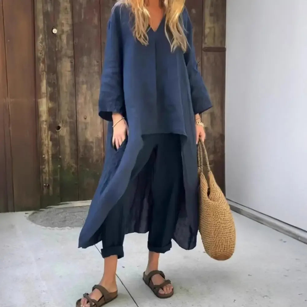 Full view of women's relaxed fit long vest paired with matching wide-leg pants