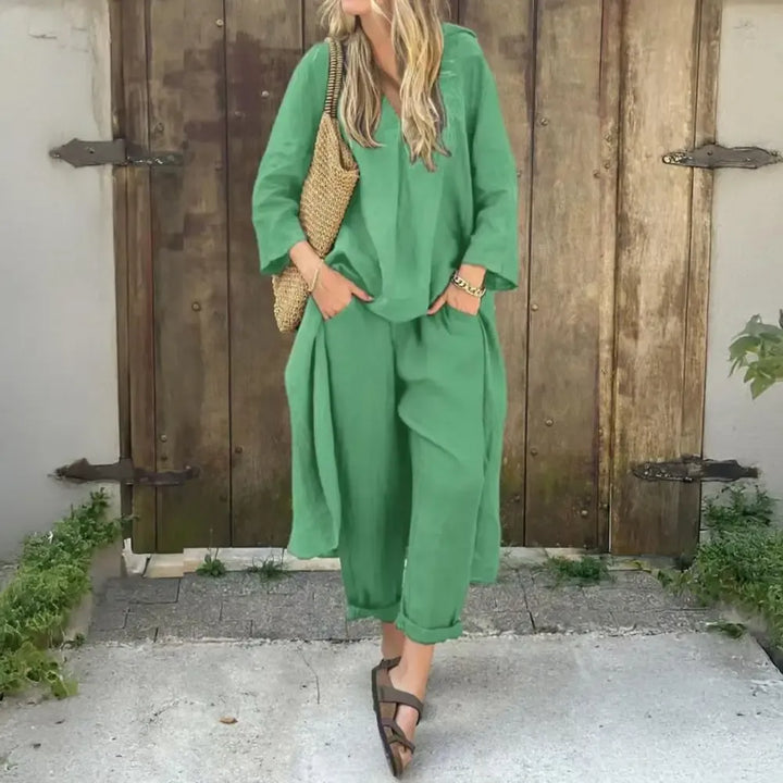 Women's casual two-piece outfit featuring a relaxed long vest and wide-leg pants