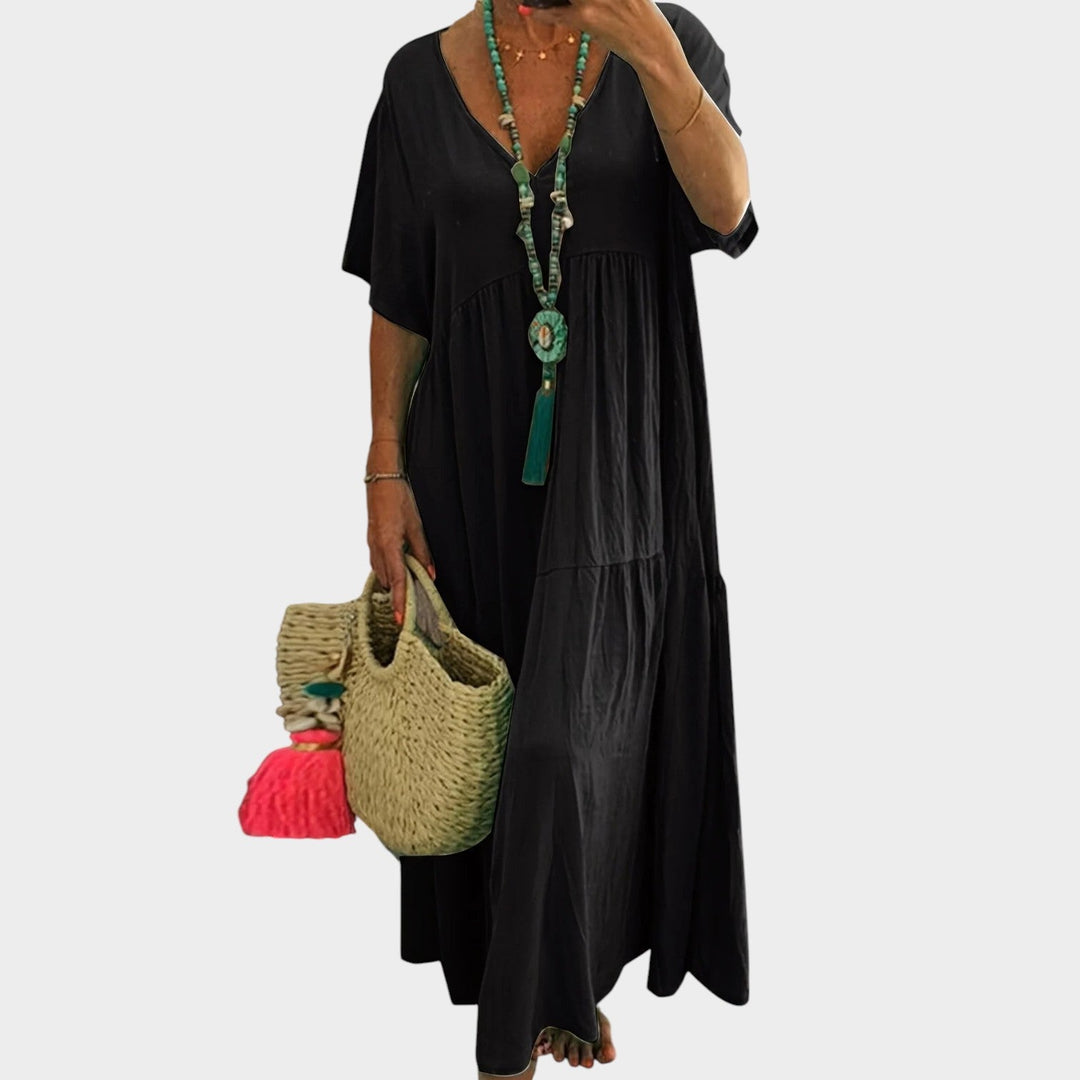 Close-up of plus size summer dress fabric texture and V-neckline detail