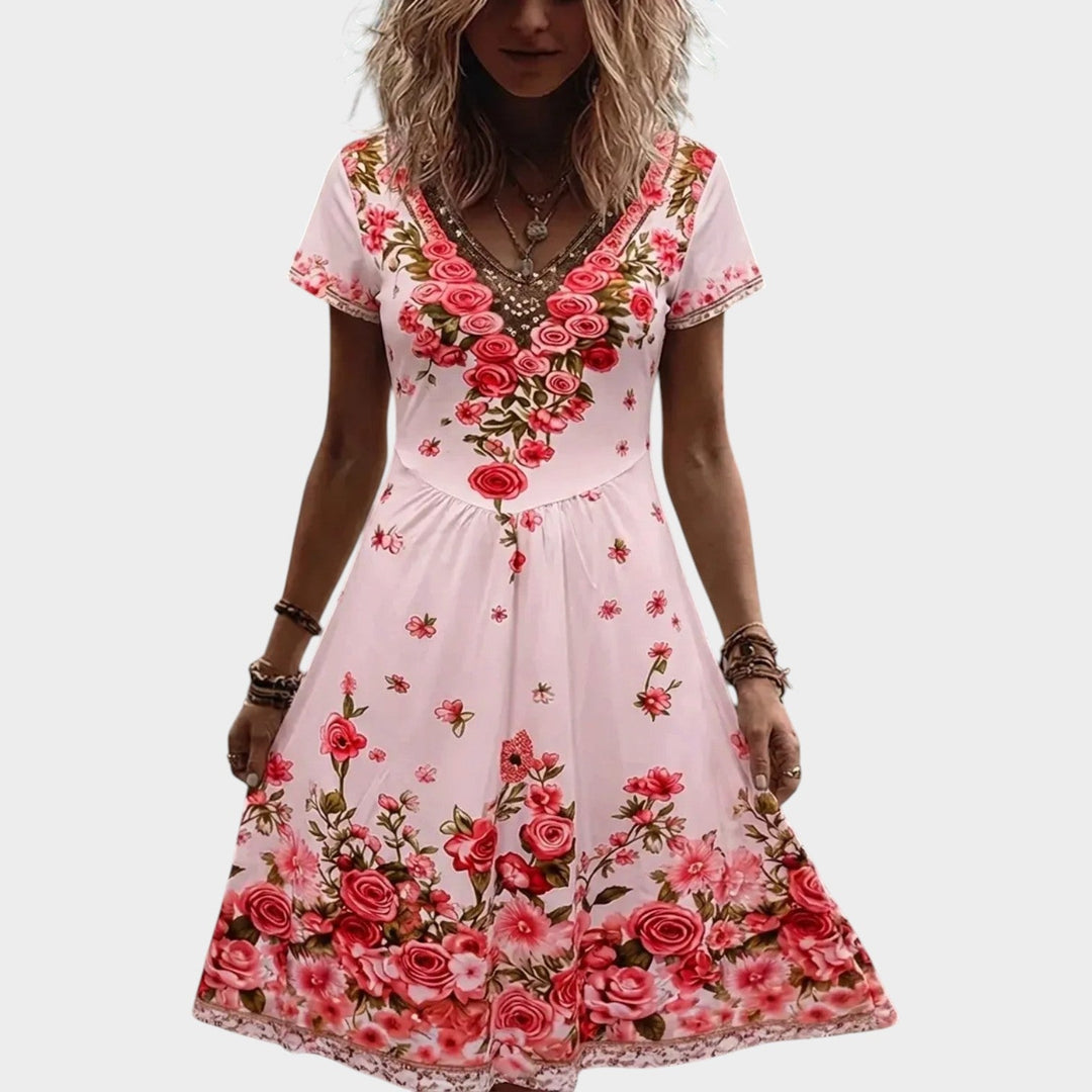 Close-up view of floral print pattern on casual women's summer midi dress
