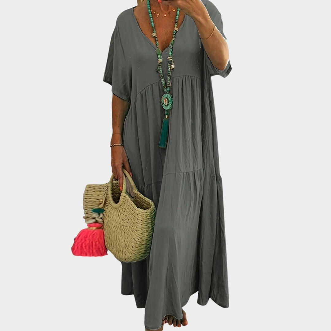 Detailed shot of plus size V-neck dress bodice and short sleeves