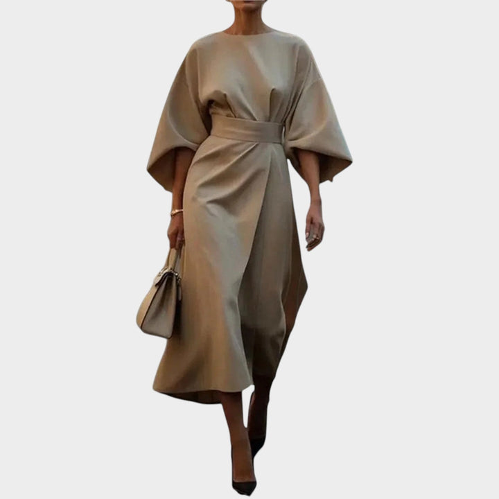 Back view of womens formal party dress featuring a flattering maxi length