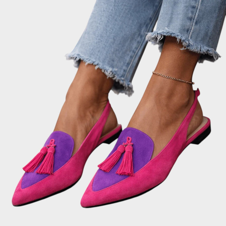 Close-up of the textured outsole and comfortable heel on casual women's summer shoes.