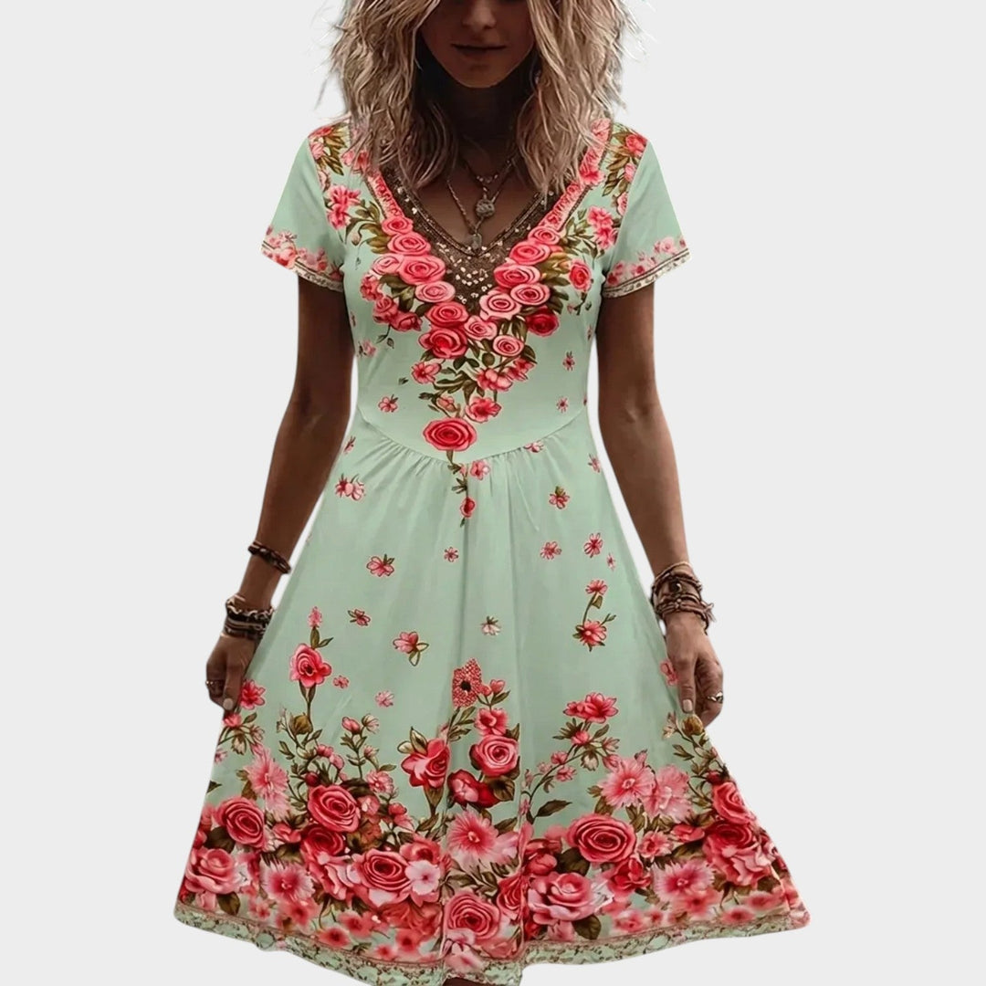 Back view of women's floral print v-neck dress with short sleeves