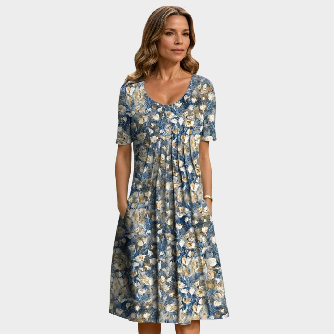 Womens floral midi dress pocket detail showing functional casual summer dress design