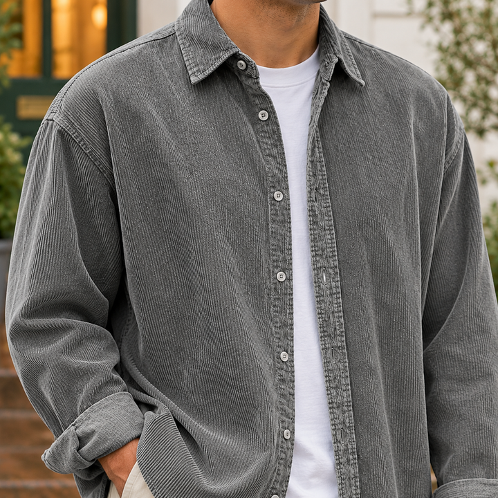 Close-up view of the gray textured overshirt collar and button details