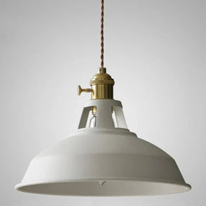 Retro style hanging light illuminating an urban loft living space