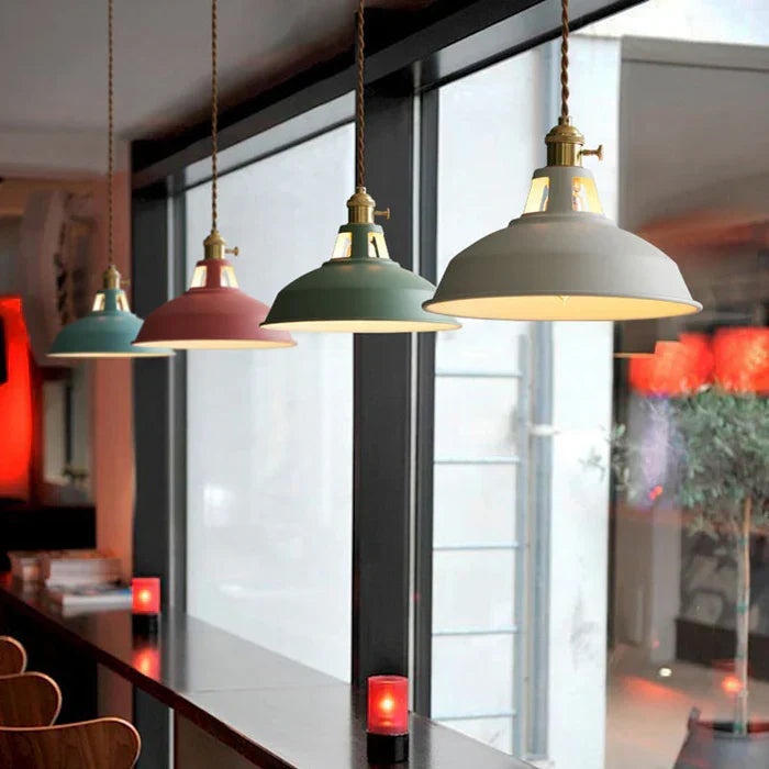 Industrial lighting pendant lamp casting warm light downward
