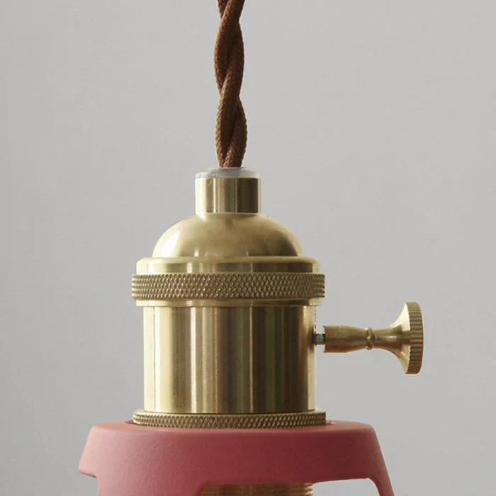 Retro decor hanging light installed in a stylish kitchen interior