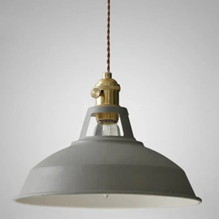 Grey industrial retro pendant lamp hanging against a neutral background