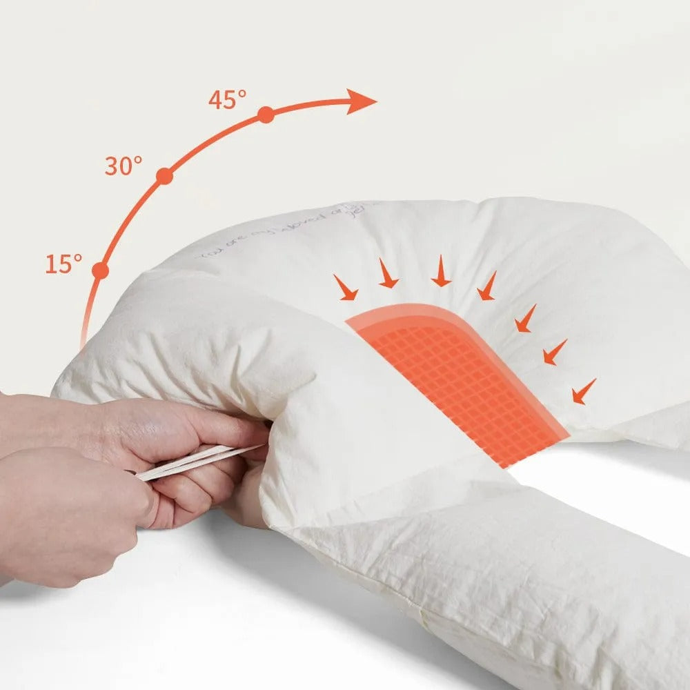 Newborn sleep positioning pillow with soft cushioned sides