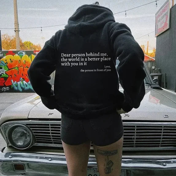 Detailed shot of drawstring hood and fabric on women's hoodie