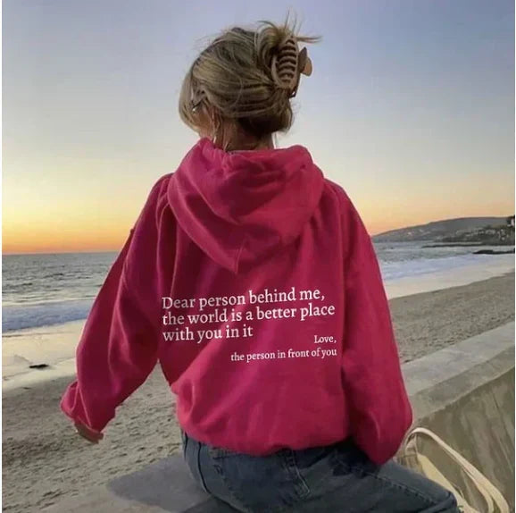 Close-up of graphic text detail on women's casual hoodie