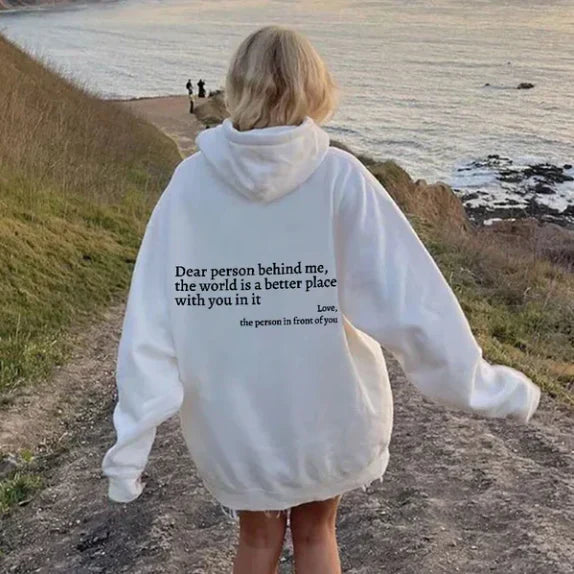 Stylish women's casual slogan hoodie paired for daily outfit