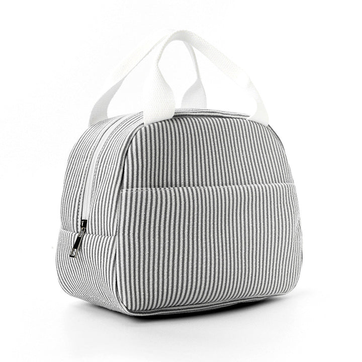 Insulated lunch tote packed with food containers for daily work meals