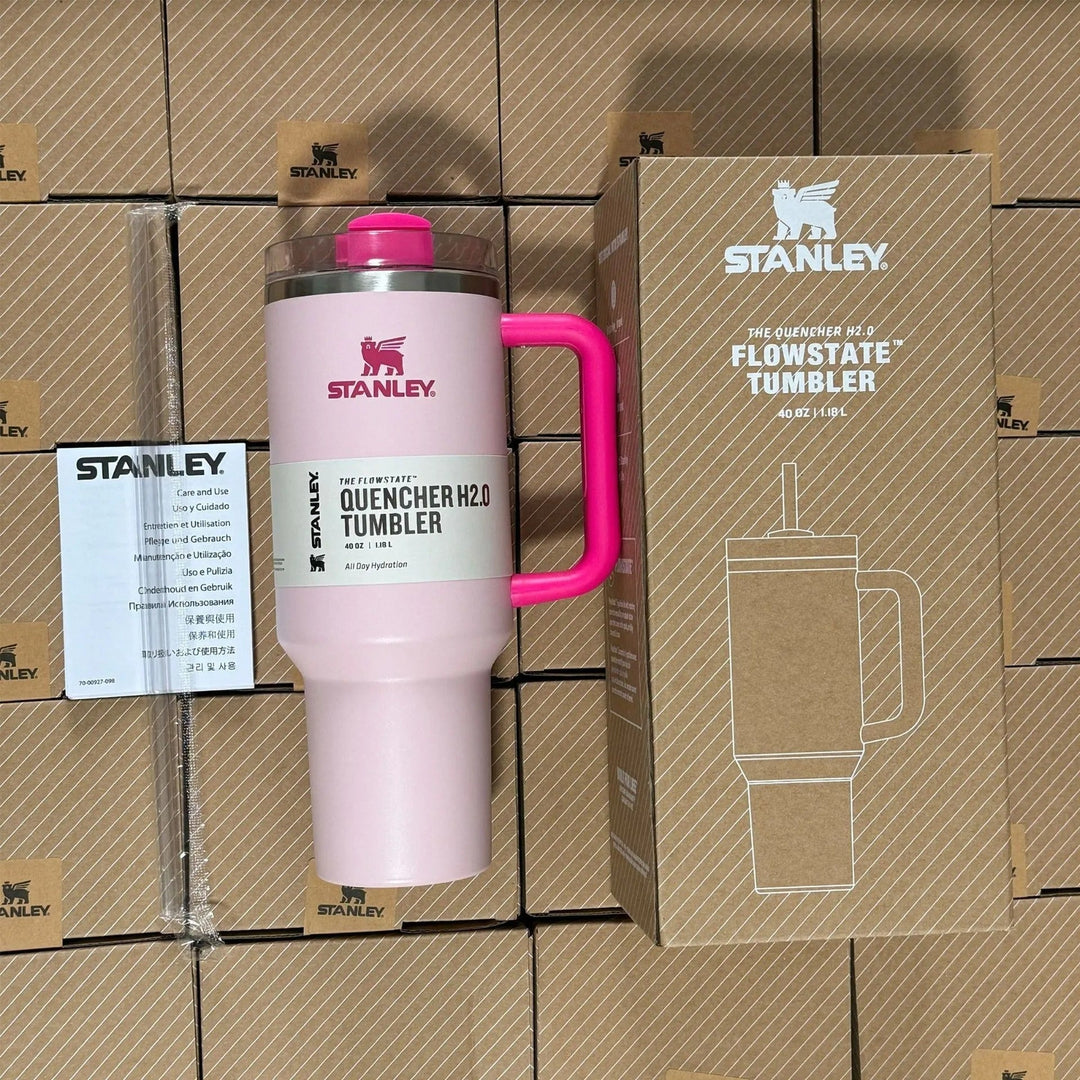Baby Pink insulated travel mug with handle and straw next to its box