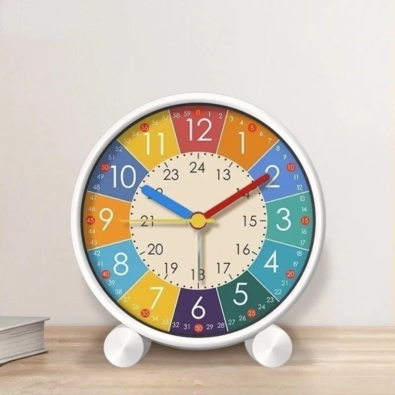 Colorful educational alarm clock for kids with bright numbers on a wooden surface