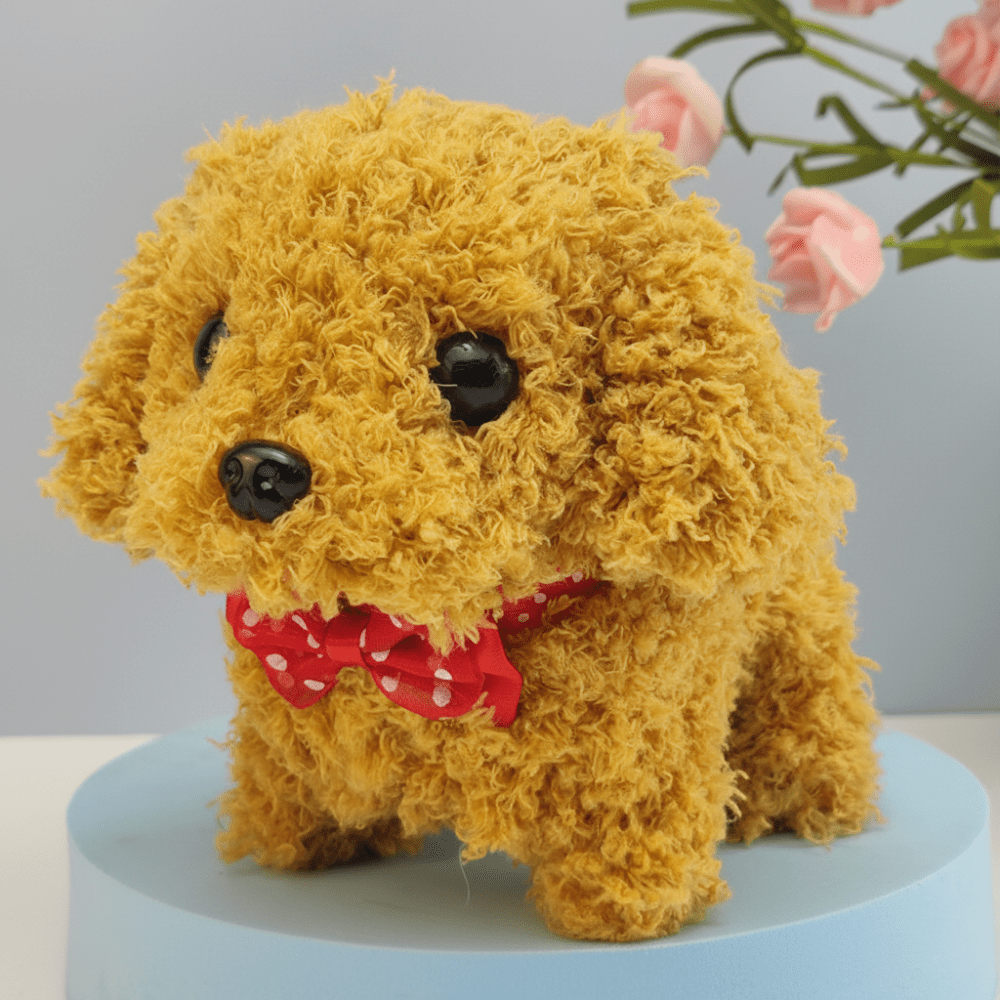 Golden brown interactive plush puppy toy with red polka dot bow tie