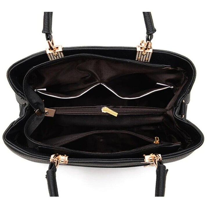 Top zipper closure detail on women's designer-style crossbody purse