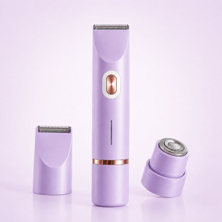 Purple women's intimate shaver with attachments displayed against a light purple backdrop