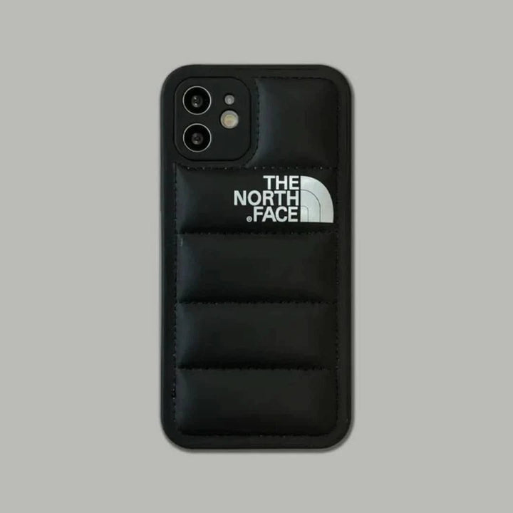 Black puffer design iPhone case shown from the back camera view.