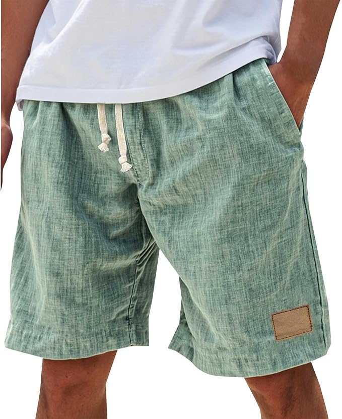 Man wearing mint green casual shorts with white t-shirt