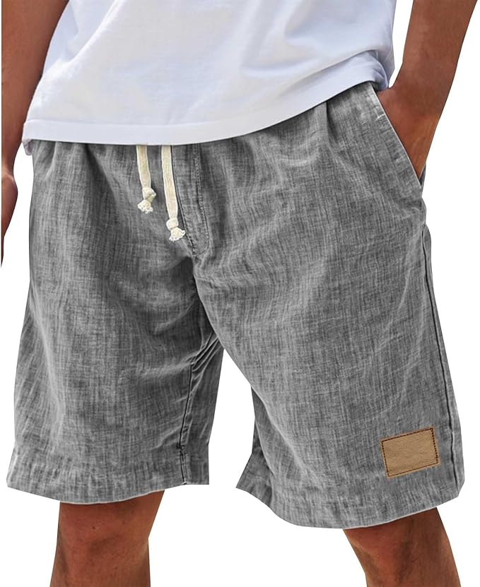 Lightweight white linen shorts designed for warm weather and beach wear