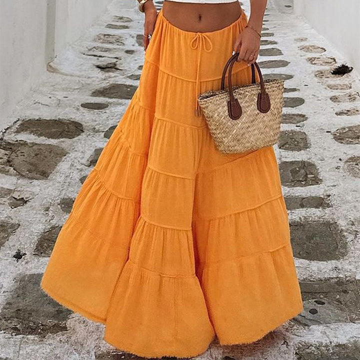 Casual summer midi skirt featuring a flattering tiered bohemian silhouette