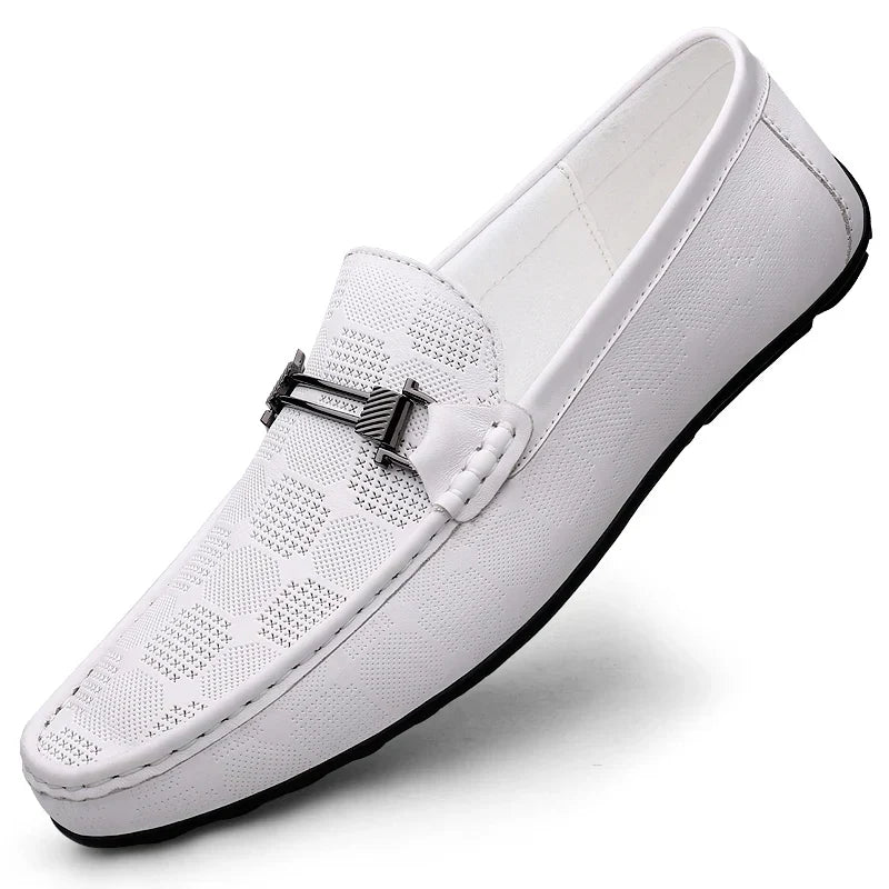 White men's Italian loafer with metallic buckle detail viewed from side angle