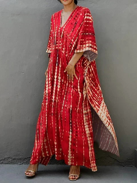 Full view of the Red Janne Kaftan Maxi Dress showcasing its flowy silhouette