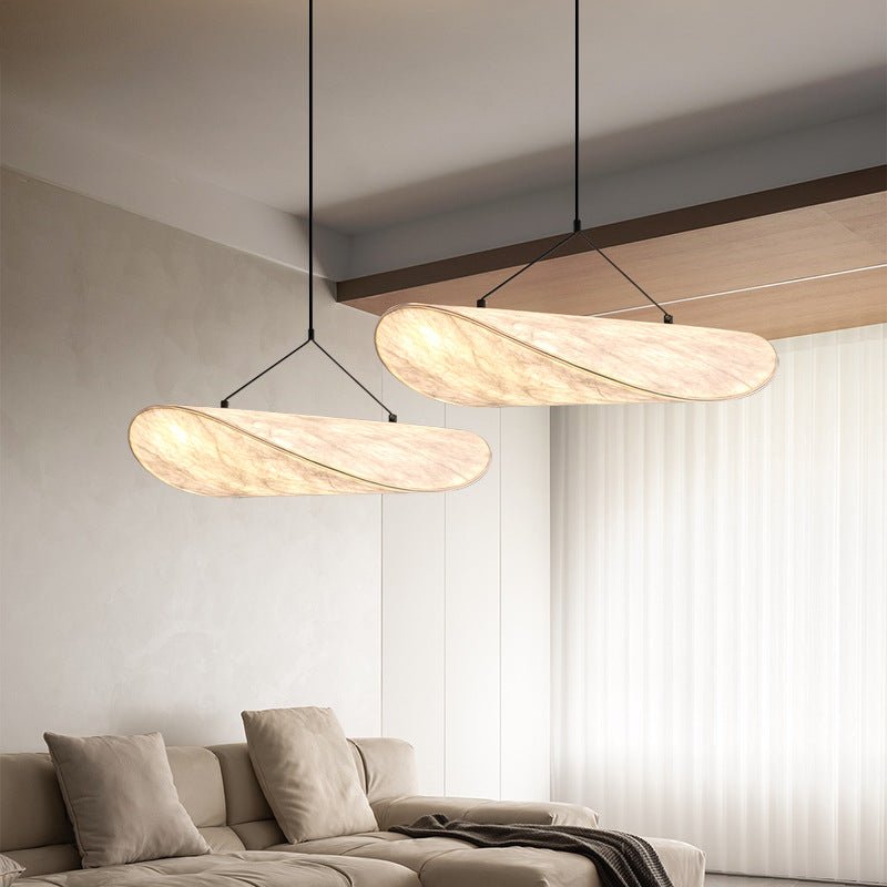 Japandi pendant lamp with silk shade showing detailed texture and warm LED lighting